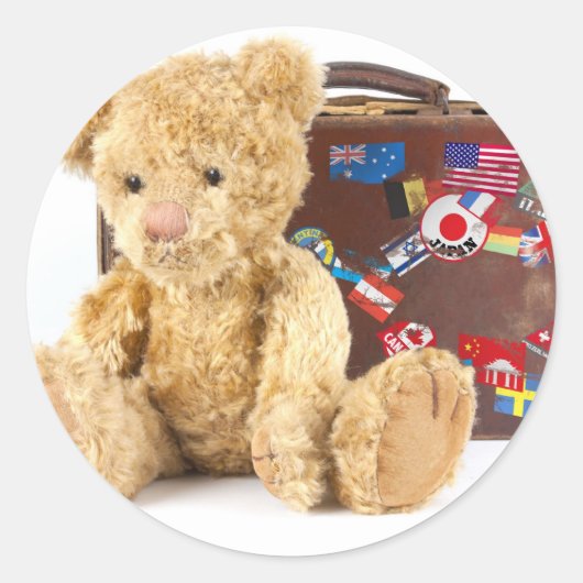 teddybeer en oude koffer met wereldsti ronde sticker (Voorkant)