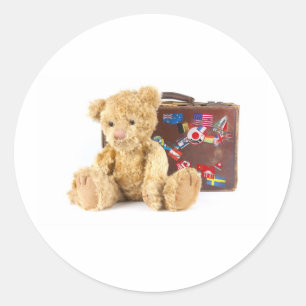teddybeer en vintage oude koffer met wereldsticker ronde sticker
