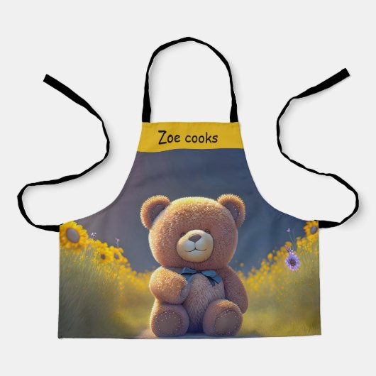 Teddybeer in een weide, schattig kinder schort (Voorkant)