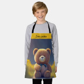 Teddybeer in een weide, schattig kinder schort (Gedragen)