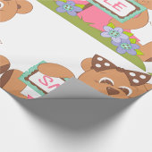 Teddybeer met boog die het lachsignaal vasthoudt cadeaupapier