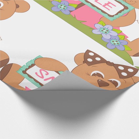 Teddybeer met boog die het lachsignaal vasthoudt cadeaupapier