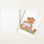 Teddybeer met boog die het lachsignaal vasthoudt planner