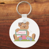 Teddybeer met boog die het lachsignaal vasthoudt sleutelhanger (Voorkant)