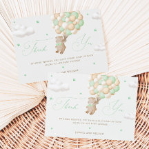 Teddybeer met groene ballonnen