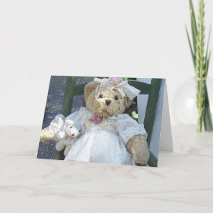 Teddybeer met hondenpop in stoel Wenskaart Kaart