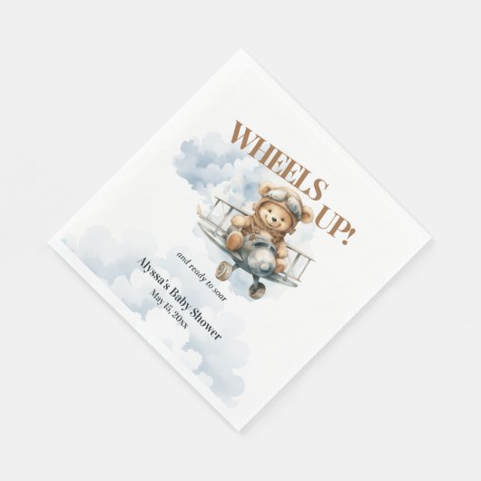 Teddybeer rijdt kleine copiloot omhoog servet (Hoek)