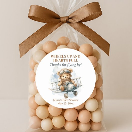 Teddybeer rolt harten vol ronde sticker