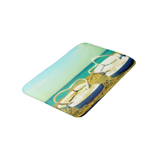 teenslippers op de strand badmat (Gekanteld)