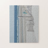 Teenslippers op het strandhek legpuzzel (Verticaal)