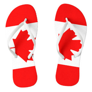 Teenslippers van het strand op Canadese vlag voor
