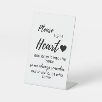 Teken een hartteken reclamebord met voetstuk