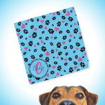 Tekenafdrukken en harten patroon Blauwe monogram Bandana<br><div class="desc">Kute bandana met zwarte pootafdrukken en roze hartenpatroon op blauwe kleur. Lovely accessoire for dogs and dog eigenaars:) ・ Personaliseer het met de naam en het monogram van een huisdier, schrap tekst of pas verder aan - geef doopvonten, kleuren uit, resize/beweeg/schrap elementen, voeg tekst en meer toe, of breng het...</div>