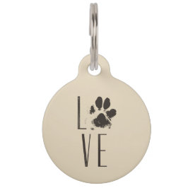 Tekenen met een pooafdrukken die liefdesverlies ui huisdierpenning