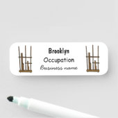 Tekening van de angklung-cartoon naamplaatje (In situ)