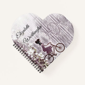  tekening van een jongedame op een fiets notitieboek