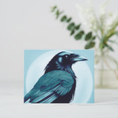 Tekening van een zwarte raaf op lichtblauw briefkaart (Staand voorkant)
