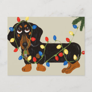 Tekkel in de Lichten Blk die van Kerstmis/Tan Feestdagenkaart