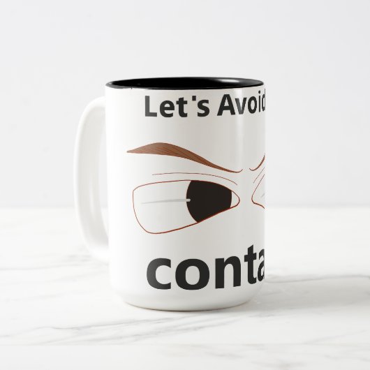 Tekst zegt oogcontact met een tekening te vermijde tweekleurige koffiemok (Voorkant links)