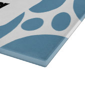 Tekstpatroon en blauw sjabloon snijplank (Hoek)