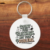 Tel je zegeningen niet je problemen sleutelhanger (Voorkant)