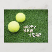 Tennis ball Happy Nieuwjaar op groen gras Briefkaart (Voorkant)
