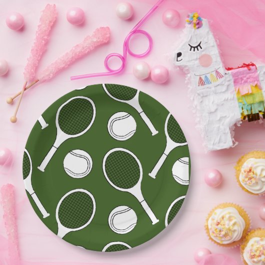 Tennis racket en zwarte kogelinkt op groen  papieren bordje (Feest)