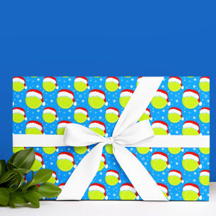 Tennisballen dragen Santa's hoed en sneeuwvlokken  Cadeaupapier
