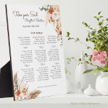 Terracotta Bloemen Bruiloft Zitkaarten Fotoplaat<br><div class="desc">Creëer Een prachtig en uniek display voor uw bruiloft receptie met deze boho veer en bloementafel stoel grafiek tafelblad plaque. Deze plaquette heeft een prachtig ontwerp van bohemien, bruine pampa's en herfst-elementen, samen met uw namen, trouwdata en tafelopdrachten. Het wordt geleverd met een ezel voor eenvoudige weergave op uw tafels...</div>