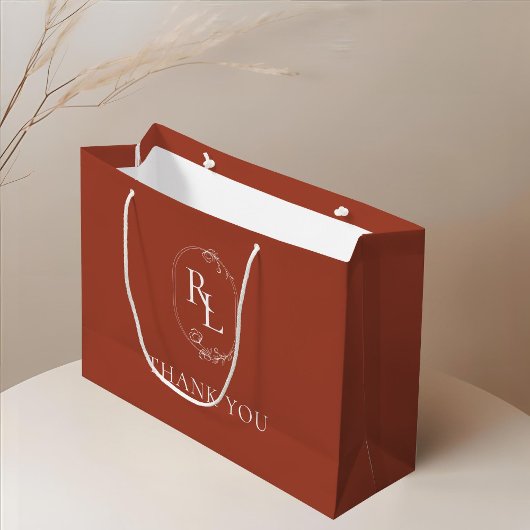 terracotta | Bloemenmonogram bruiloft Dank u Groot Cadeauzakje