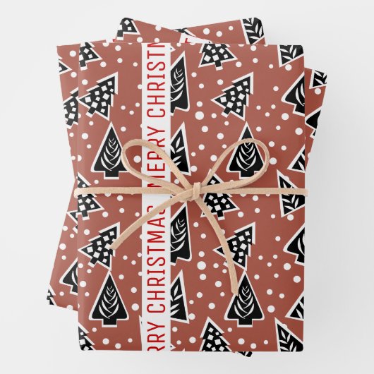 Terracotta en zwarte kerstbomen inpakpapier vel (In situ)