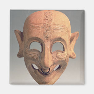 Terracotta grinning mask uit San Sperate, 6de-5de Magneet