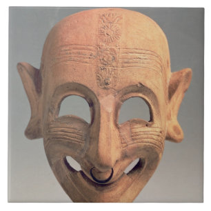 Terracotta grinning mask uit San Sperate, 6de-5de Tegeltje