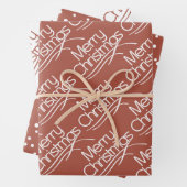 Terracotta, witte kersttypografie en stippen inpakpapier vel (In situ)