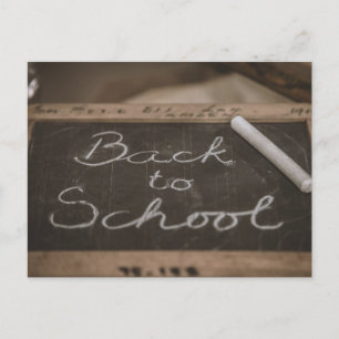 Terug naar school op een oude schoolslate feestdagenkaart