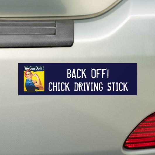 TERUG UIT, CHICK DRIVING STICK BUMPERSTICKER (Op auto)