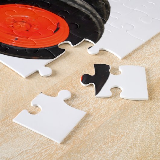 Teruggezette rode trekker legpuzzel (Zijkant)