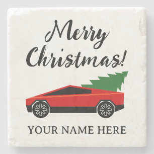 Tesla pick-uptruck die een kerstboom vervoert stenen onderzetter