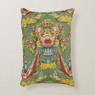 Textiel met een herhalend bloemmotief decoratief kussen