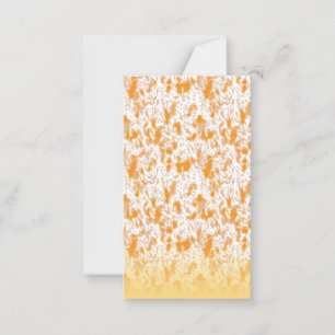 Textielpatroon met een levendig oranje en goud notitiekaartje