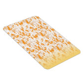 Textielpatroon met een levendig sinaasappel en gou magneet (Rechterzijde)