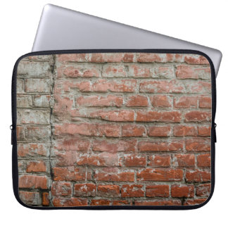 Textuur. Brick. Wall. A background with attritions Laptop Sleeve