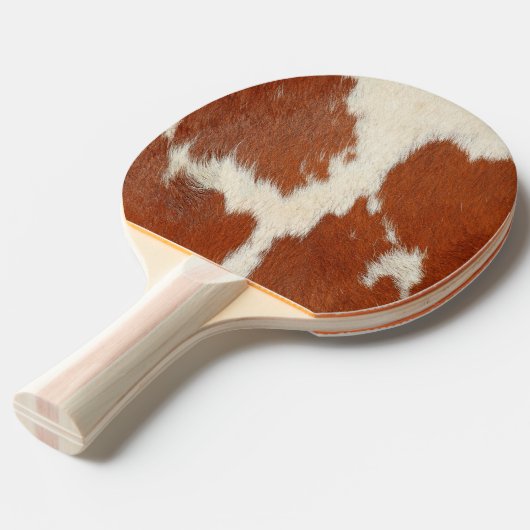 textuur van bruin en wit koeienhuid tafeltennisbatje (Voorkant Gekanteld)