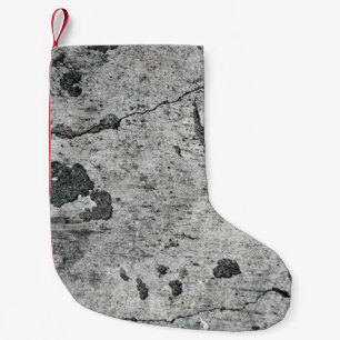 Textuur van een oude muur van gekraakt beton. Acht Kleine Kerstsok