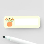 Thanksgiving bloemen in pompoen naamplaatje (In situ)