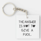 The answer is not to give a f sleutelhanger (Voorkant)