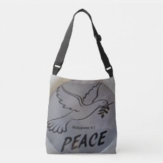 The bag features peace dove and scripture. crossbody tas