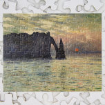 The Cliff Etretat, Sunset by Claude Monet Legpuzzel<br><div class="desc">De Cliff, Etretat, Sunset (1883) van Claude Monet is een impressionistisch kunstschilderij. De zon is laag in de lucht boven de oceaan. Een zeeseizoen met een rotsachtige buitenkant bij de kust van Etretat, Frankrijk. Over de kunstenaar: Claude Monet (1840-1926) was een oprichter van de Franse impressionistische schilderbeweging, waarbij de meeste...</div>