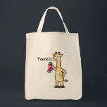 The "Everything Finder" Giraffe Canvas Tote Bag<br><div class="desc">Because we all know everything ends up at the bottom of a tote bag eventually. Carry your essentials (and your found treasures) in style. Eco-friendly,  aesthetic,  and speaks the truth about the daily struggle. Your new go-to bag for the gym,  grocery store,  or campus.</div>