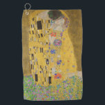 The Lovers Kissingembrace by Gustav Klimt Golfhanddoek<br><div class="desc">Het zonlicht schittert door de wervelende gouden omhelzing die de geliefden omringt in Gustav Klimts meesterwerk, The Kiss. De scène is een paradox van intimiteit en isolatie. Het paar staat op een afgrond, een veld van kleurrijke bloemen aan hun voeten, maar ze zijn zich niet bewust van de wereld om...</div>